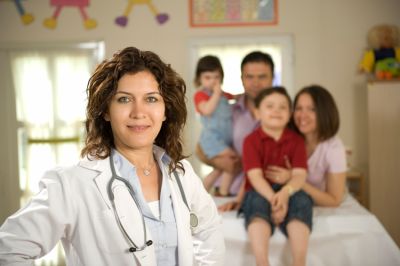Consultation with health insurance expert reviewing individual health insurance plans in Suite 501, CA